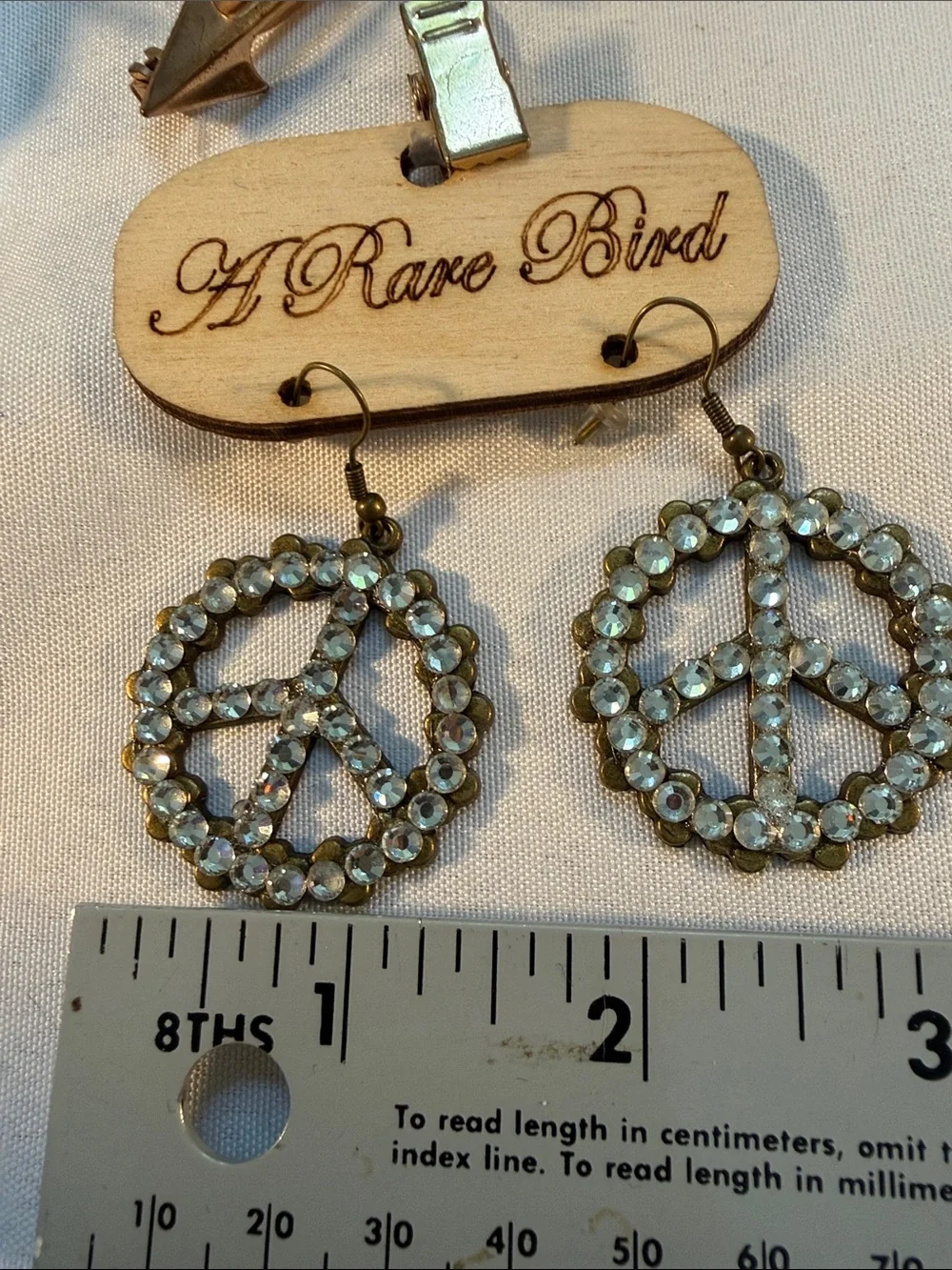 A rare bird Crystal Peace Sign Drop Earrings NWT $49 2.25” x 1.5”